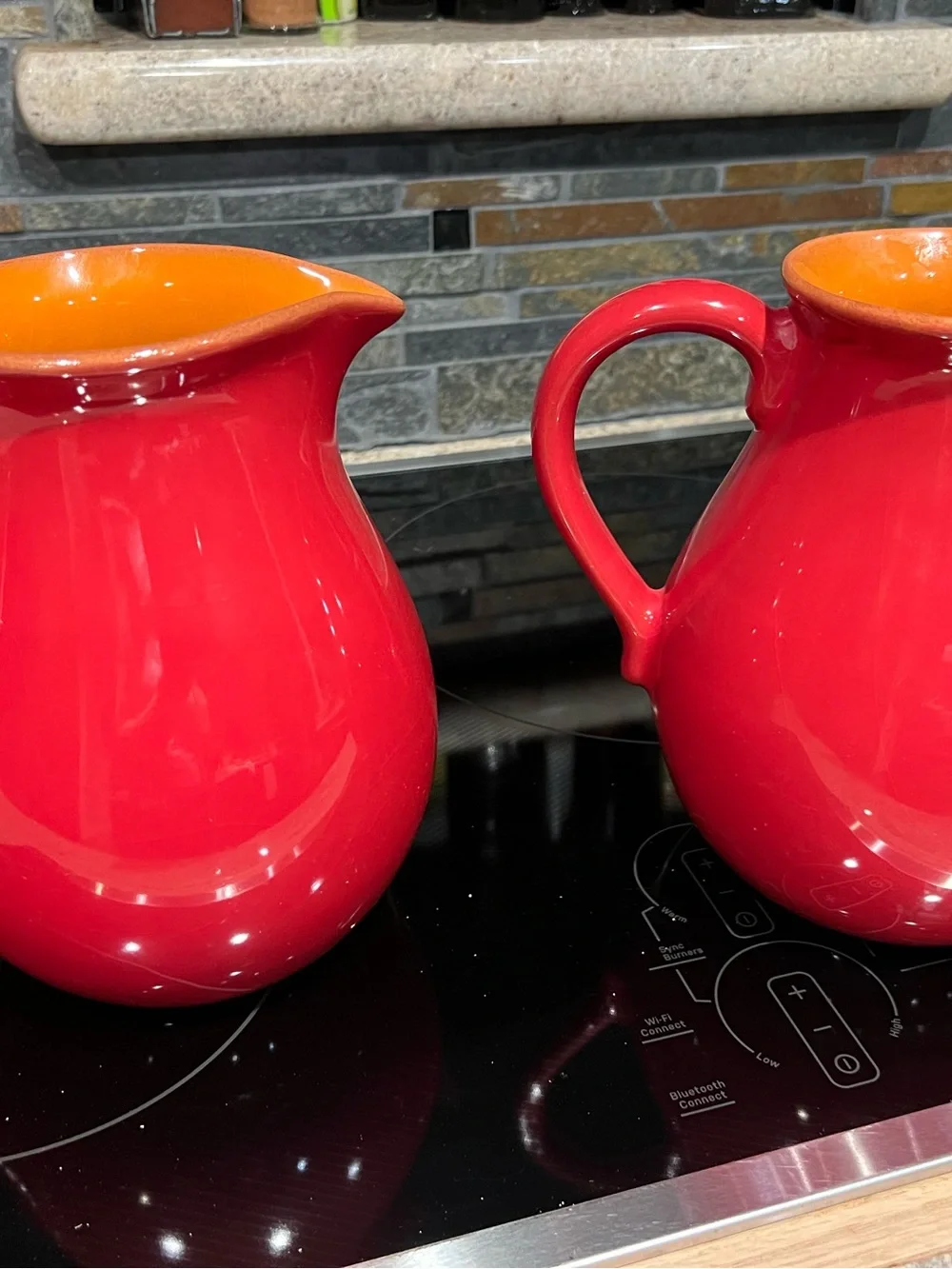 Crate and Barrel Red Ceramic Pitchers with terracotta Interior